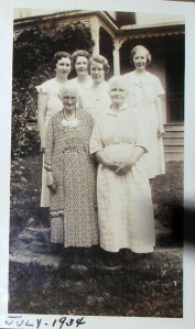 Margaret Carney Cone, her sister, Mary Carney O'Mara. Some of Mary's daughters standing behind them.